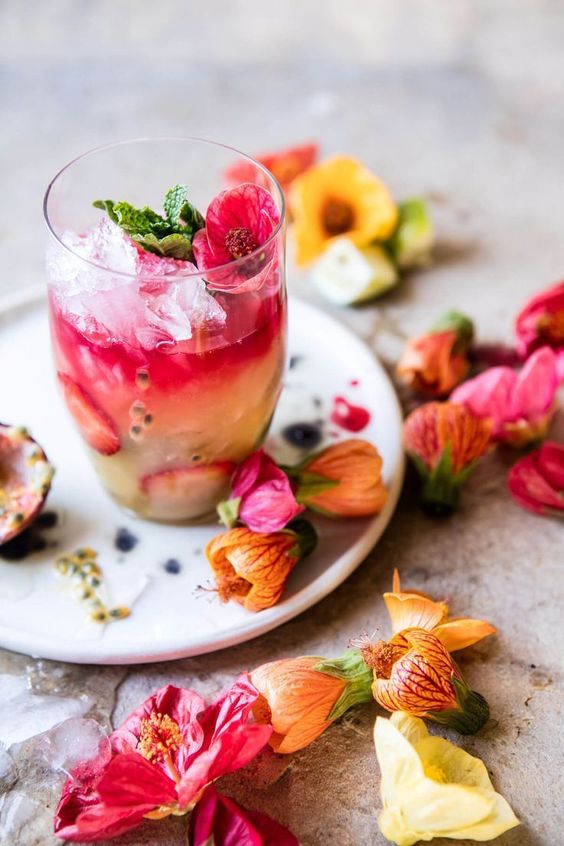 Tropical Strawberry Hibiscus & Rose Rum Smash.
